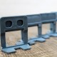 Base niveladora gris 1mm 3/64" 100uds.