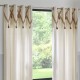 Cortina de algodón beige con pompones de yute 140x260cm
