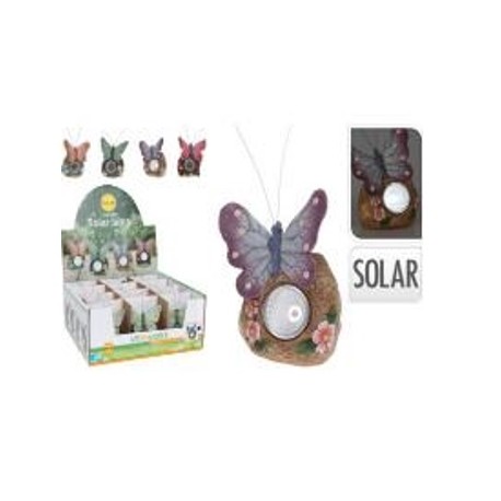 Figura solar mariposa posada